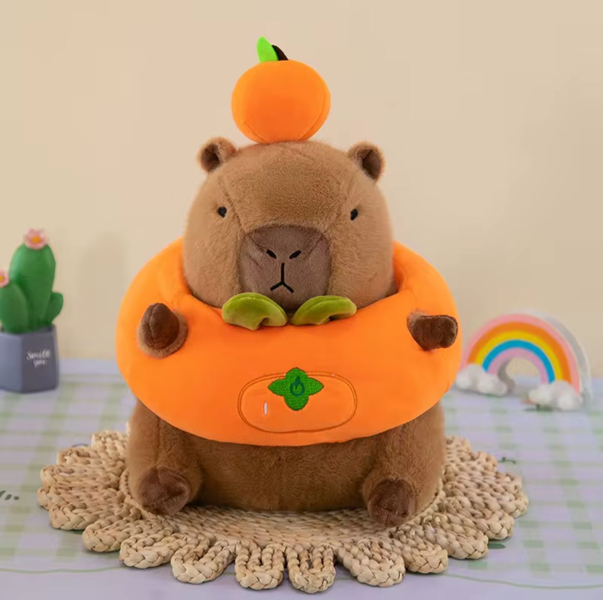 PELUCHE DE CAPYBARA C/CALABAZA
